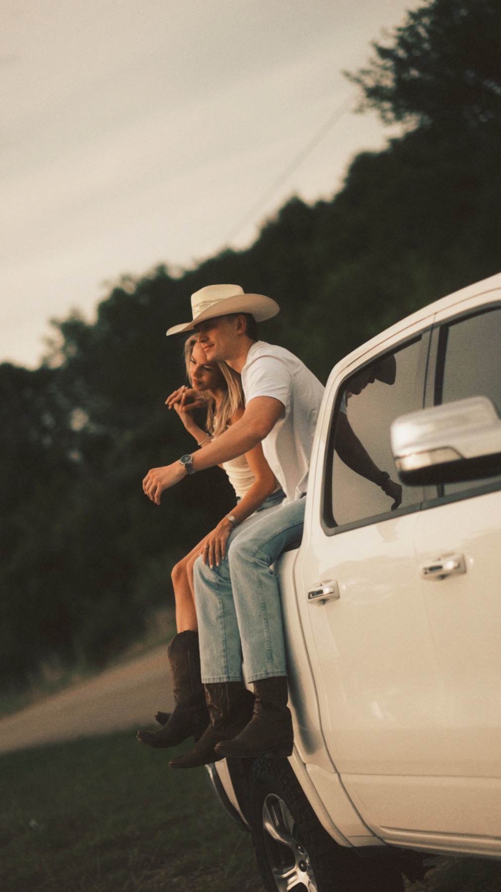 Couple at sunset on a truck
