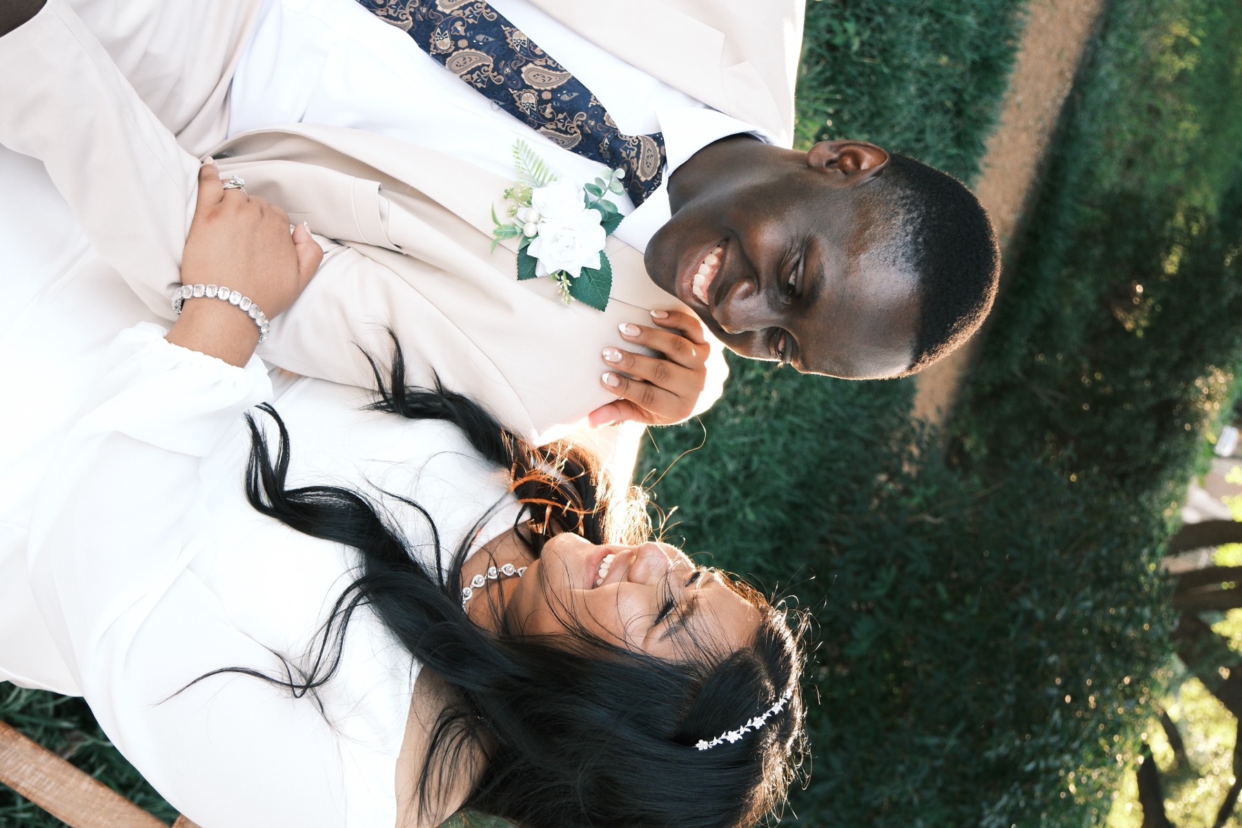 Couple laughing together outdoors