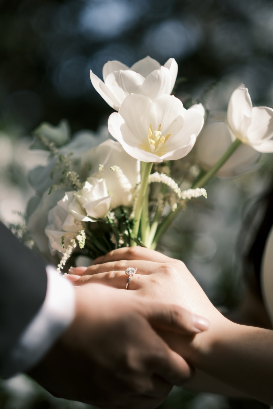 Engagement ring and bouquet detail