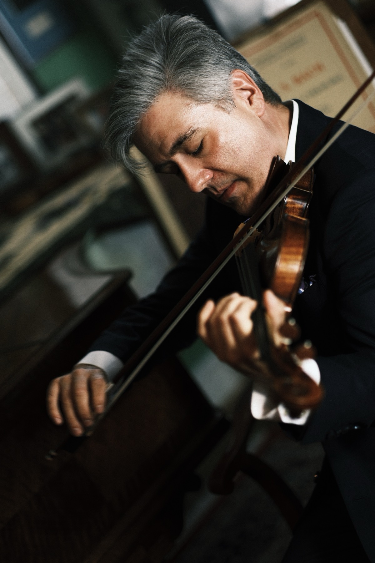 Violinist in tuxedo, close-up